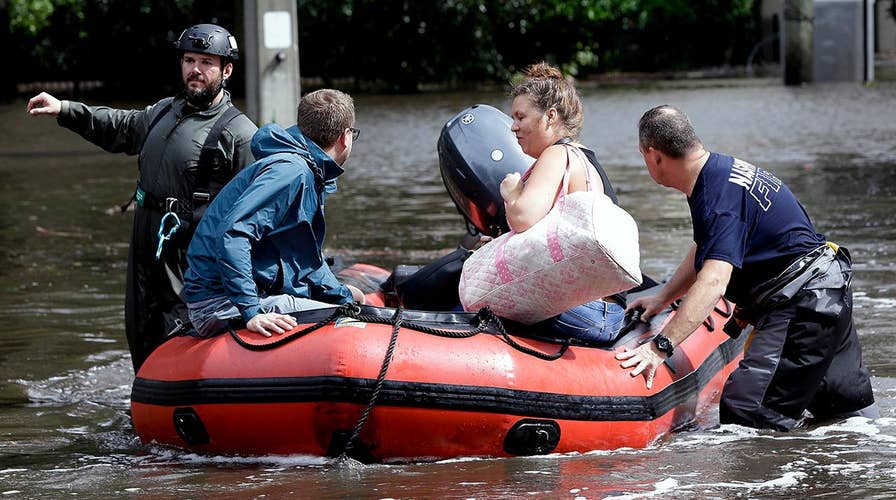 Hundreds rescued from record floodwaters in Jacksonville