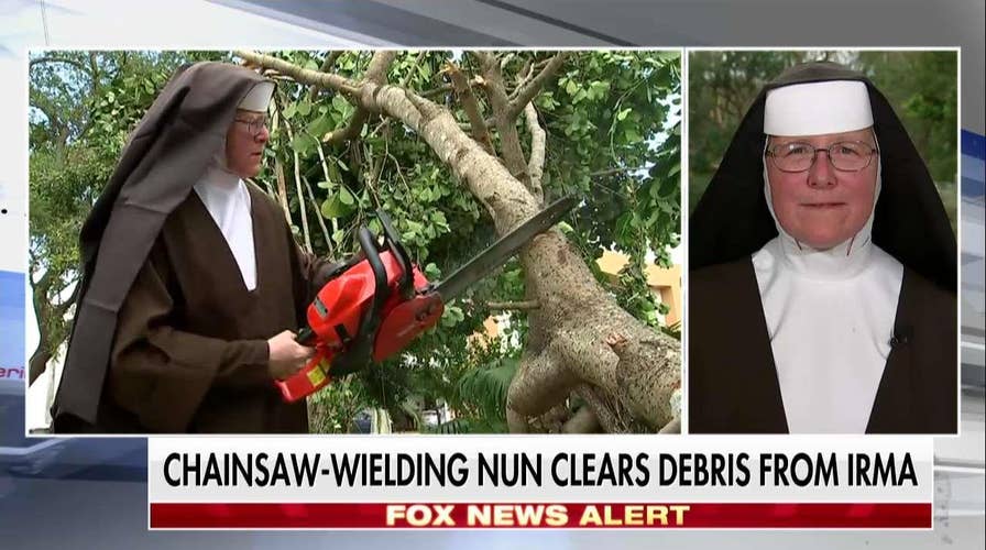 Miami Nun Saws Trees Out of Street