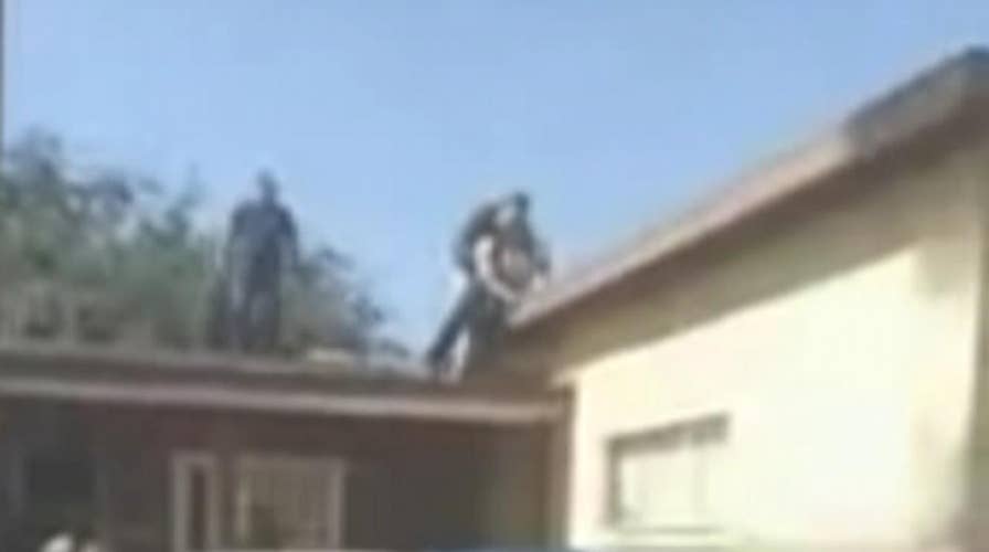 California grandpa pushes suspect off roof