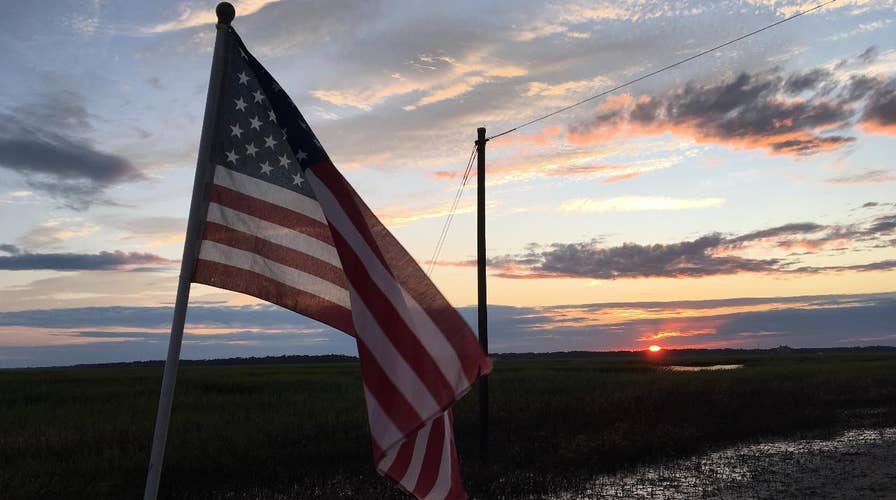 Cops save American flag from Irma floodwaters