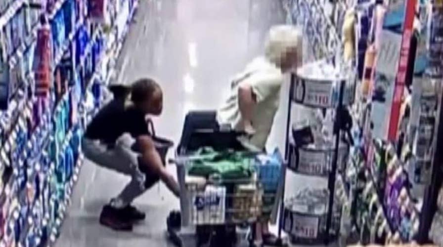 Security camera catches thief swiping elderly woman's purse