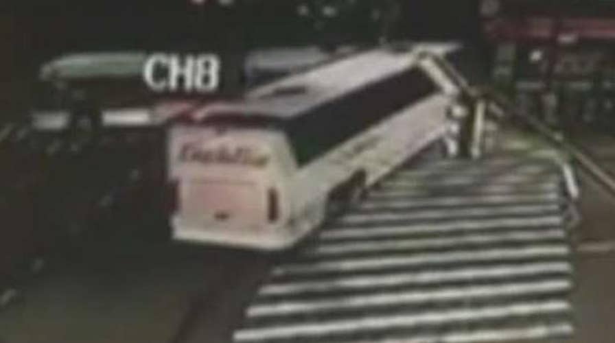 Bus plows through intersection, crashes with another bus