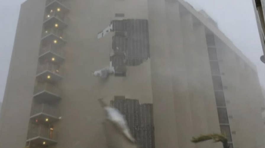 Hurricane Maria's winds rip side off building in San Juan