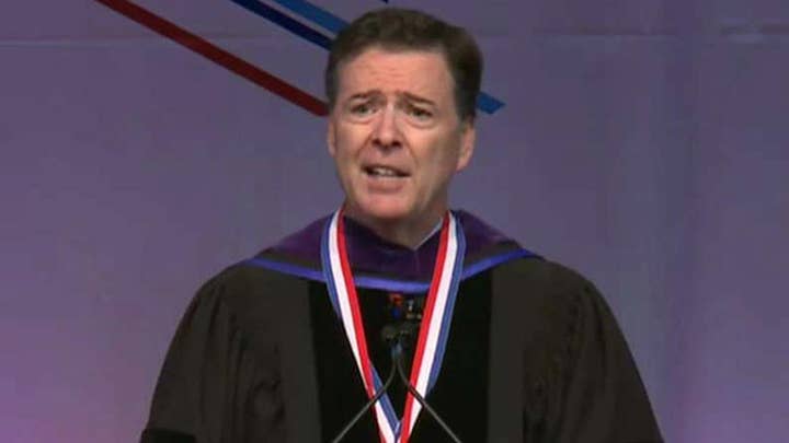 Protesters interrupt speech by former FBI chief James Comey