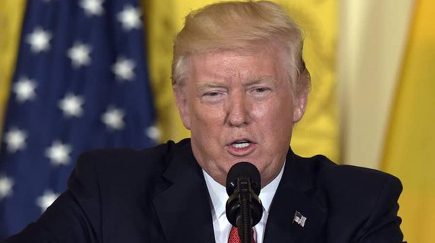 Trump defends federal response to crisis in Puerto Rico