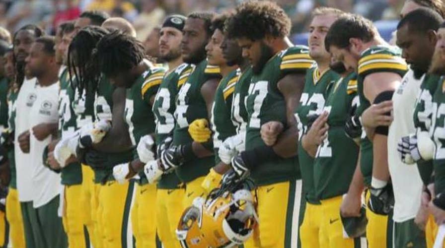 Green Bay Packers ask fans to lock arms during anthem