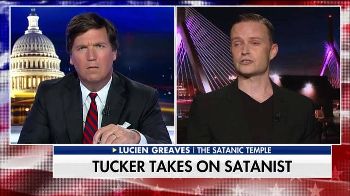 'You're Just a Troll': Tucker Takes on Satanist