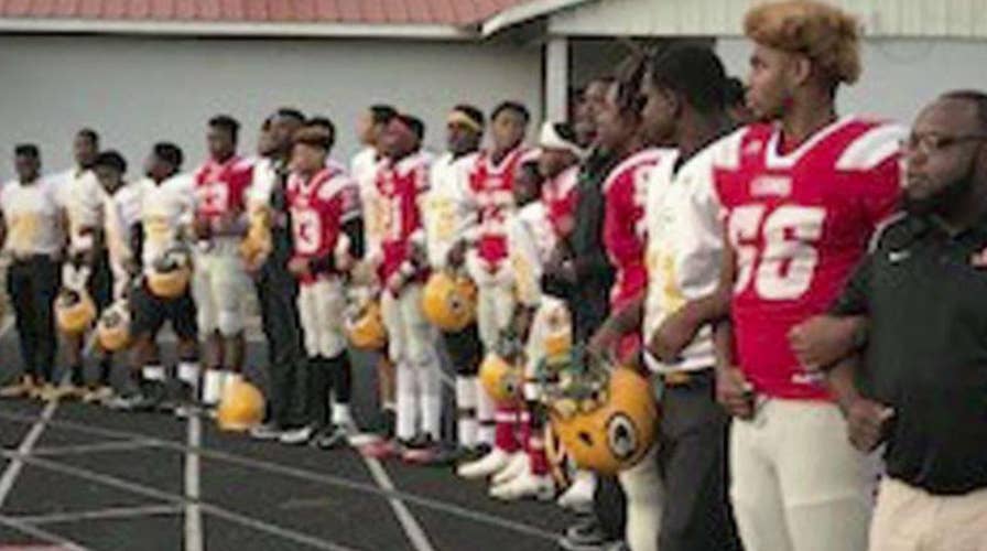 Louisiana school requires athletes to stand for anthem