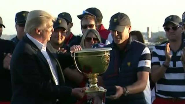 Trump dedicates golf trophy to people of Puerto Rico