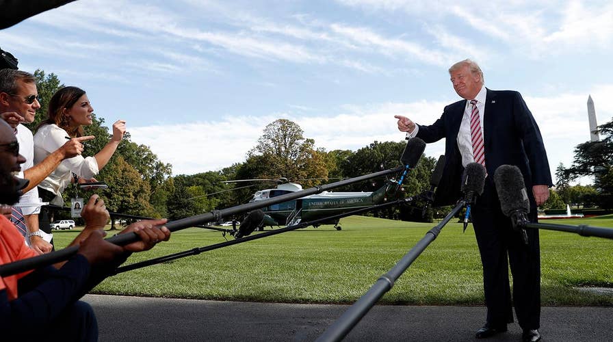 Trump hits hurricane 'fake news'