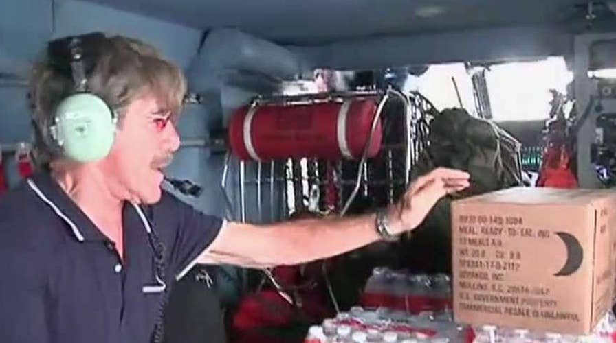 Geraldo Rivera flies with Coast Guard in Puerto Rico
