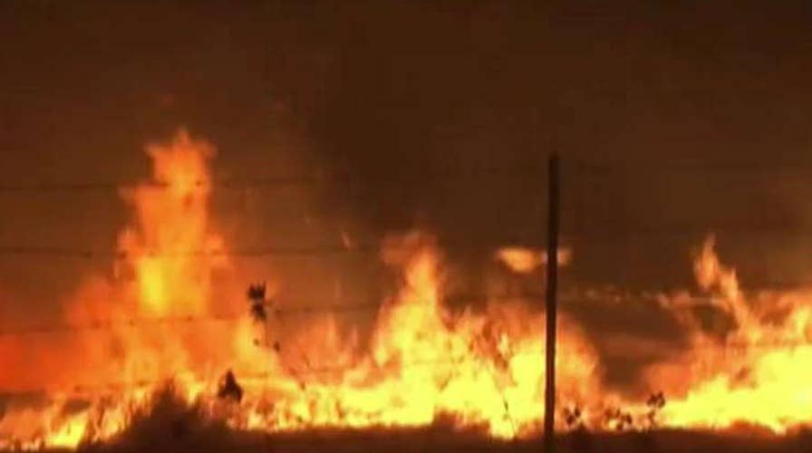 Raging wildfires rip through California wine country