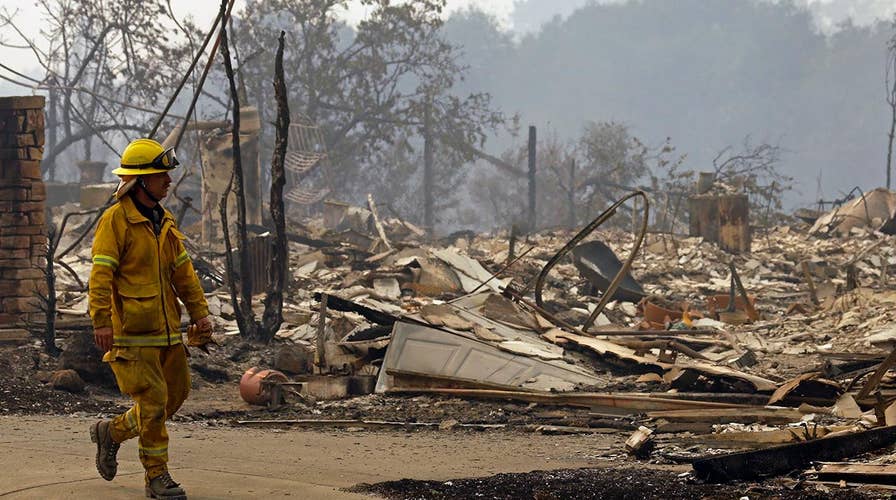 Northern California wildfires kill at least 13