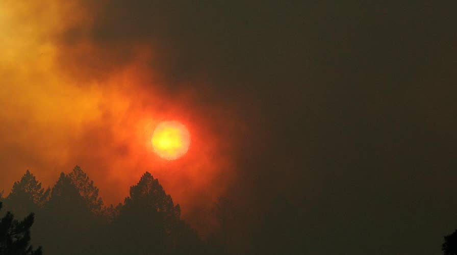 Devastation, death toll grow in historic California fires