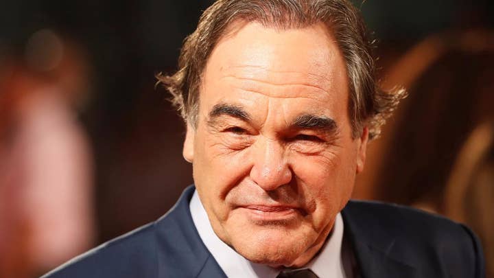 Ex-Playmate accuses Oliver Stone of grabbing her breast