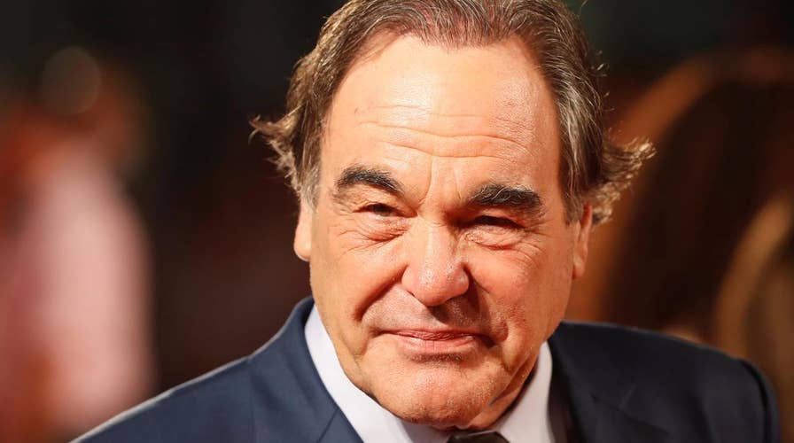 Ex-Playmate accuses Oliver Stone of grabbing her breast