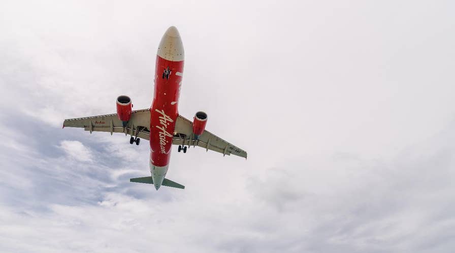 AirAsia flight plummets 20,000 feet in 9 minutes
