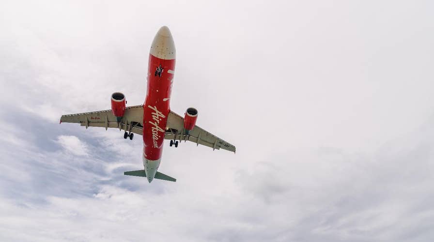 AirAsia flight plummets 20,000 feet in 9 minutes