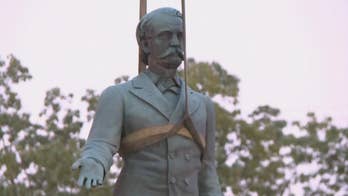 Lexington uses private funds to take down two Confederate statues