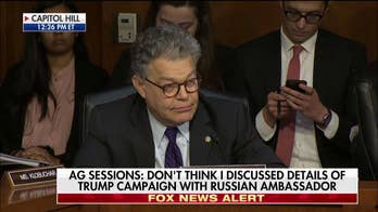 Sessions, Franken heat up the hearing room on Russia