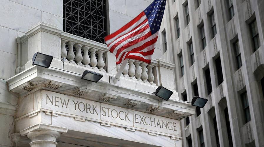 Dow closes above 23,000 for the first time