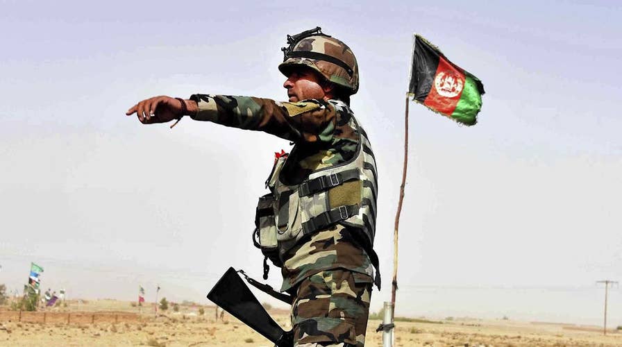 Taliban launch deadly assault on Afghan base