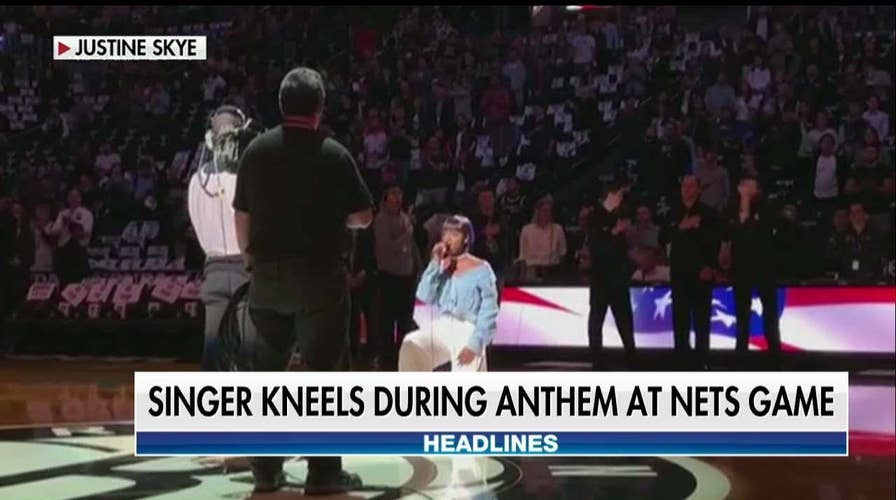 Singer Kneels for National Anthem at Brooklyn Nets Game