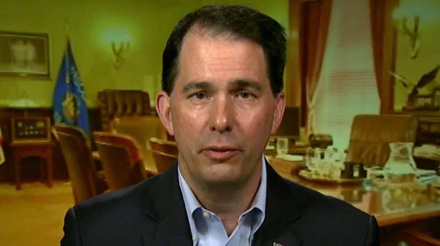 Gov. Scott Walker praises the GOP tax reform plan