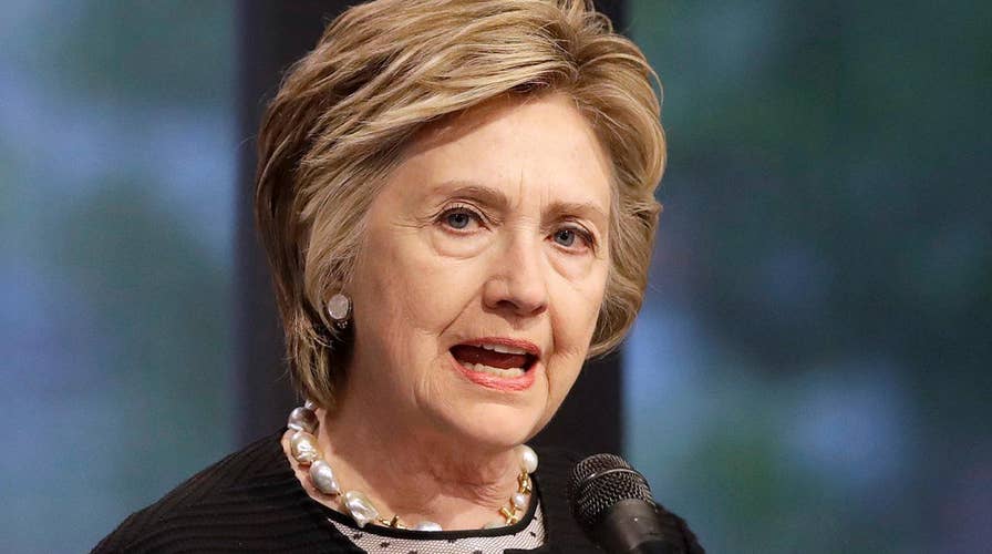 White House slams Clinton team after dossier reports