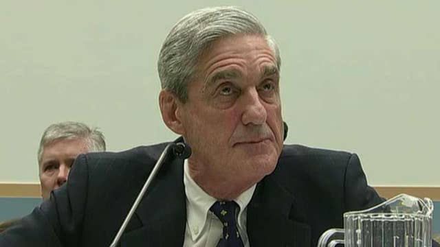 Report: First charges filed in Russia probe