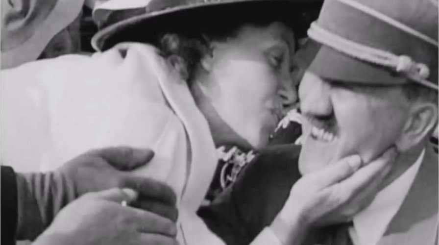 Adolf Hitler kissed by American woman in shocking video