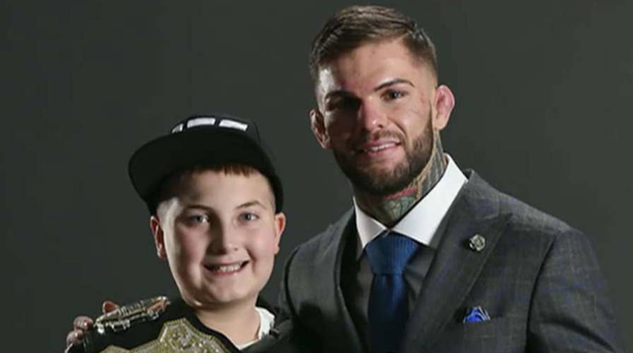 11-year-old cancer survivor inspires UFC champion