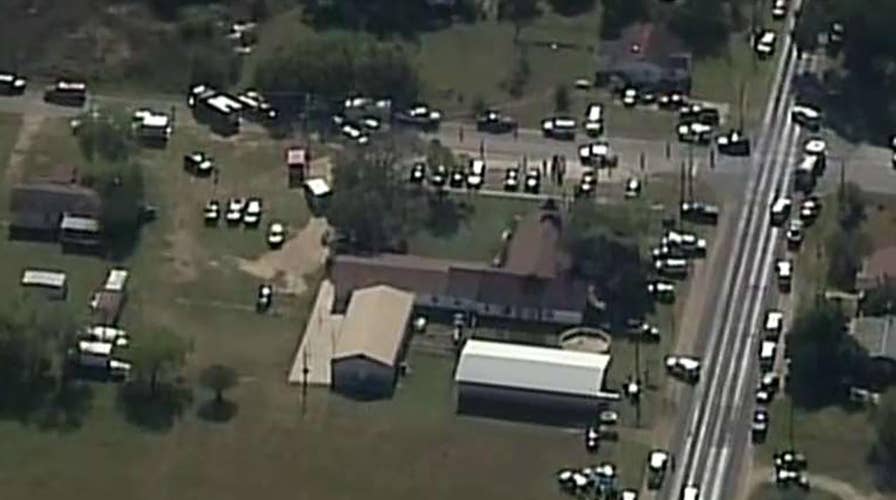 Families gather at community center after church shooting