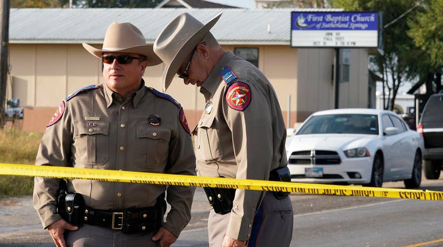 Authorities hunt for motive in Texas church massacre