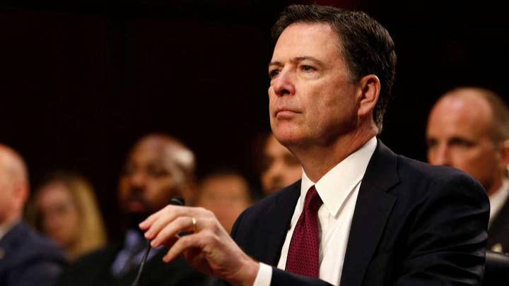 Draft shows Comey softened language on Clinton email case