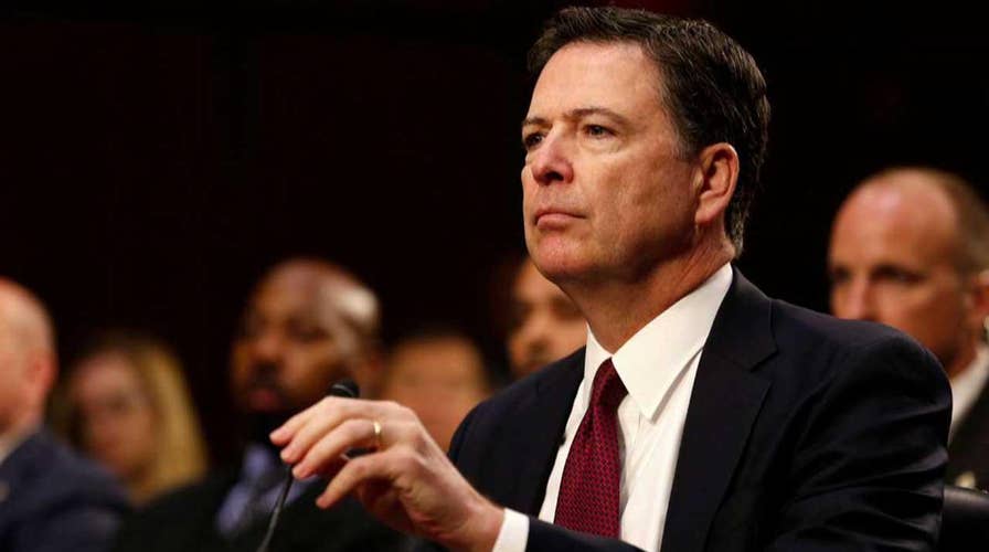 Draft shows Comey softened language on Clinton email case