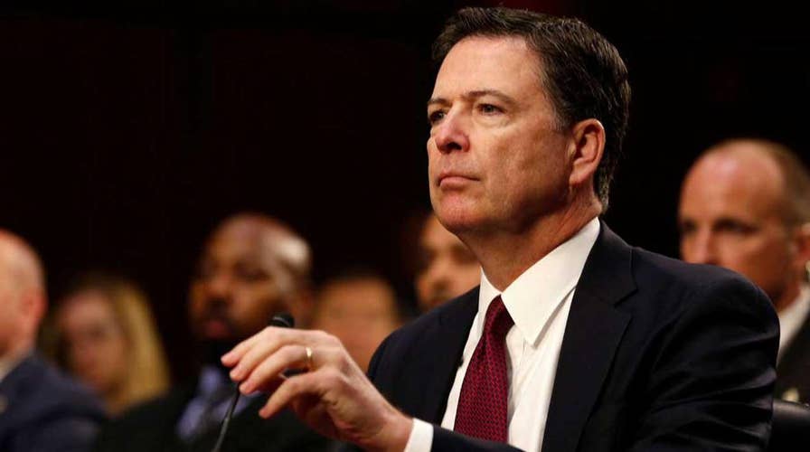 Draft shows Comey softened language on Clinton email case