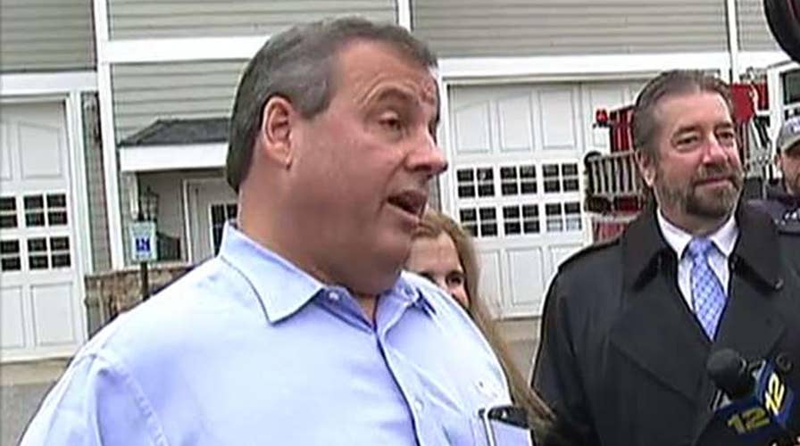 Christie argues with a voter at a polling station