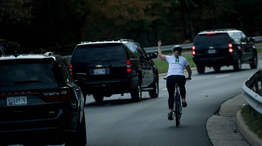 Woman fired after viral photo of her giving Trump the finger