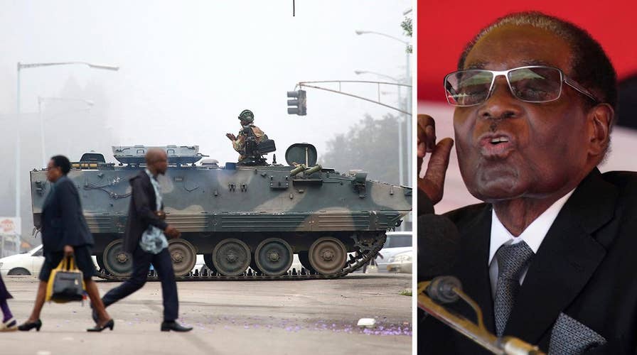 Longtime Zimbabwe President Mugabe under house arrest