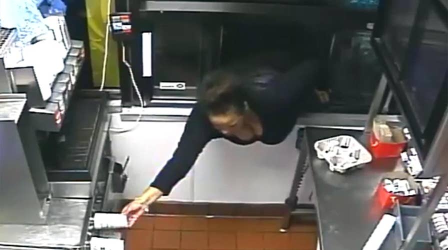 Woman climbs through drive-thru window to steal food, cash