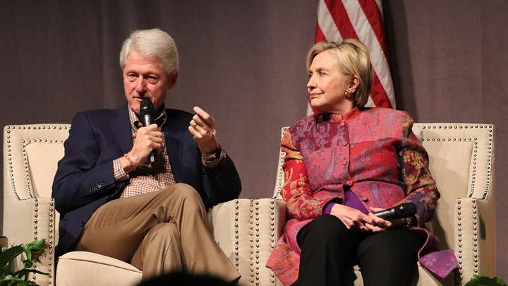 Clintons return to the stage amid Dems civil war