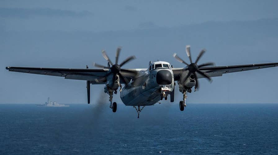 8 people rescued, 3 missing after Navy plane crash