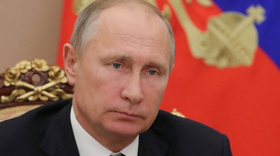 Putin signs new law listing US media as government agents