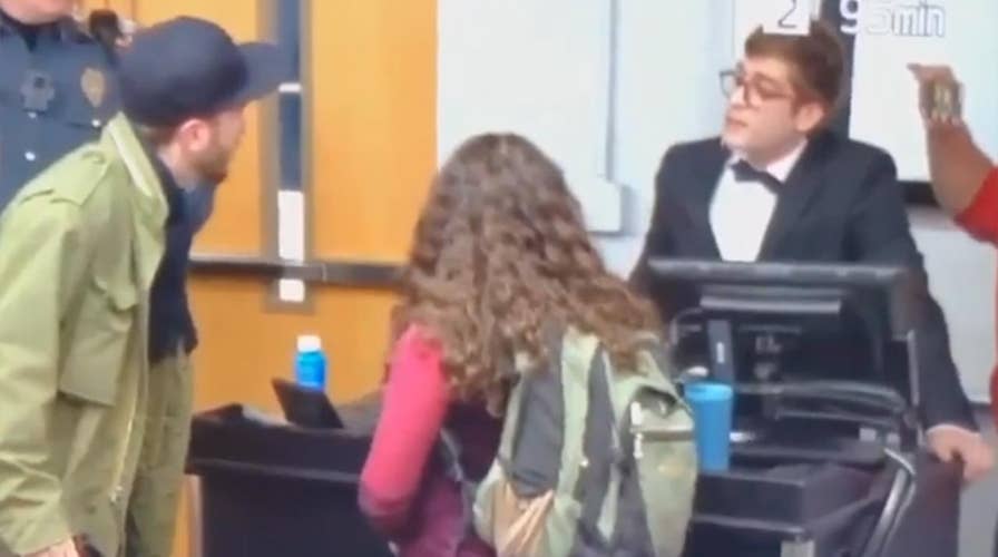 Conservative blogger arrested at 'It's OK to be white' rally