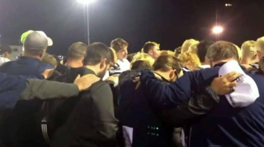 Atheists claim coach broke the law by praying with team