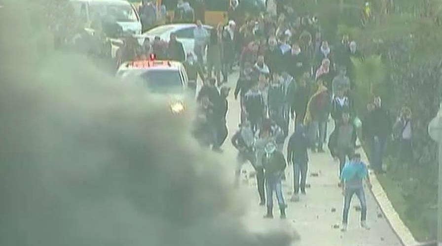 Palestinian protesters, Israeli troops in violent clash
