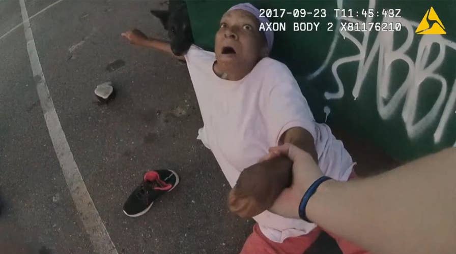 Warning, graphic content: K-9 attacks woman taking out trash