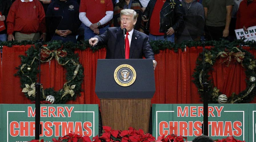 Trump stands by his border wall, security promises