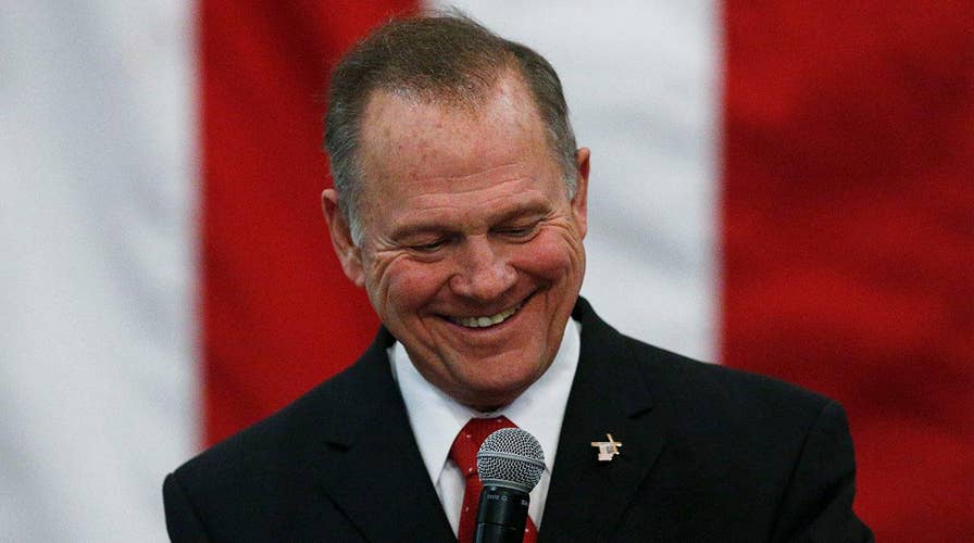 How do evangelicals reconcile faith in god with Roy Moore?